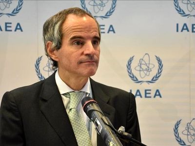 IAEA chief visits Tehran to discuss lifting of sanctions