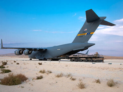 US military plane carrying weapons lands at Syria