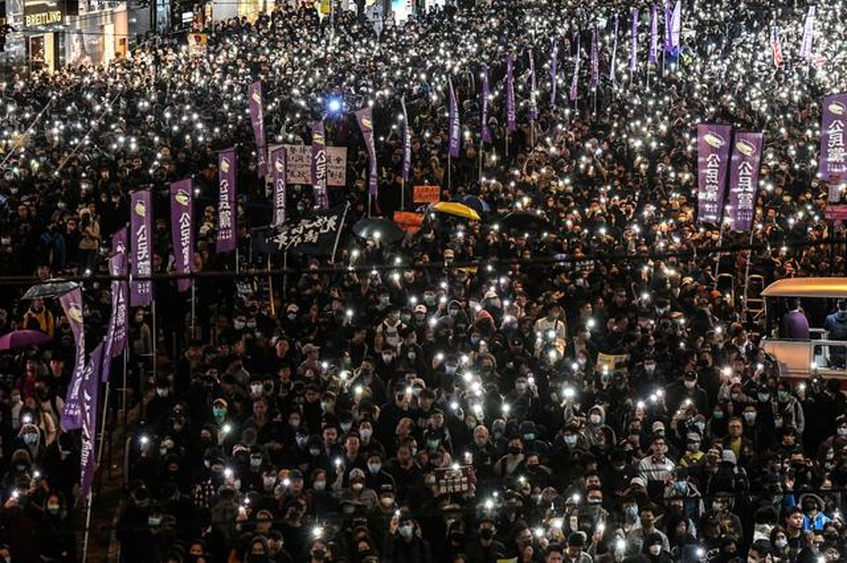 Peaceful Hong Kong march marred by fire outside court, police say