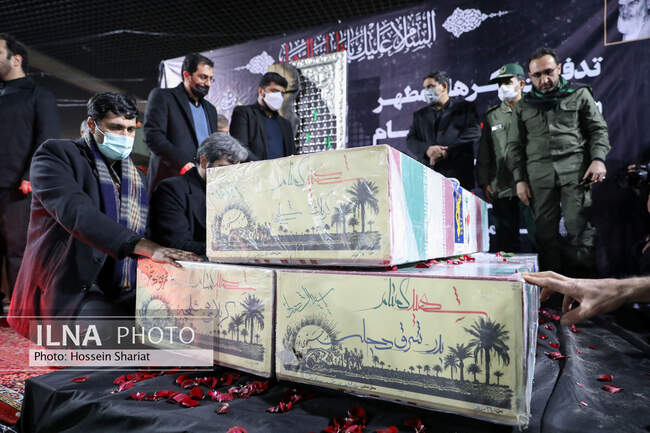 تدفین سه شهید گمنام در عرصه میدان شهدای مشهد