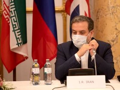 Iran not to halt nuclear activities until bans fully lifted: Araghchi