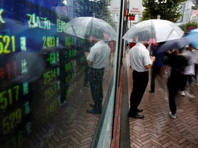 Asia shares reach record, Nikkei restrained by lockdown risk