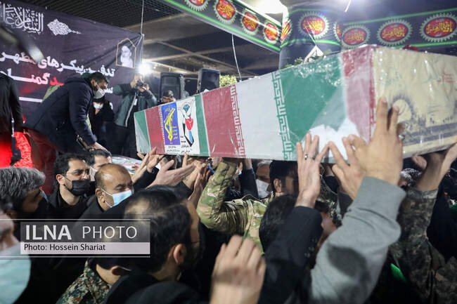 تدفین سه شهید گمنام در عرصه میدان شهدای مشهد